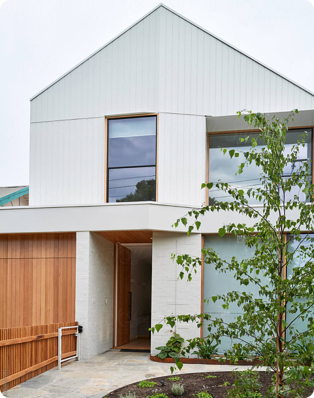 A modern home with solar panels installed on the roof, promoting sustainable energy use and eco-friendly living.