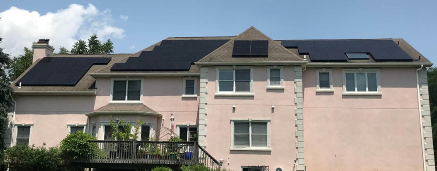 A beautiful home with solar panels installed, harnessing the power of the sun for clean, renewable energy.