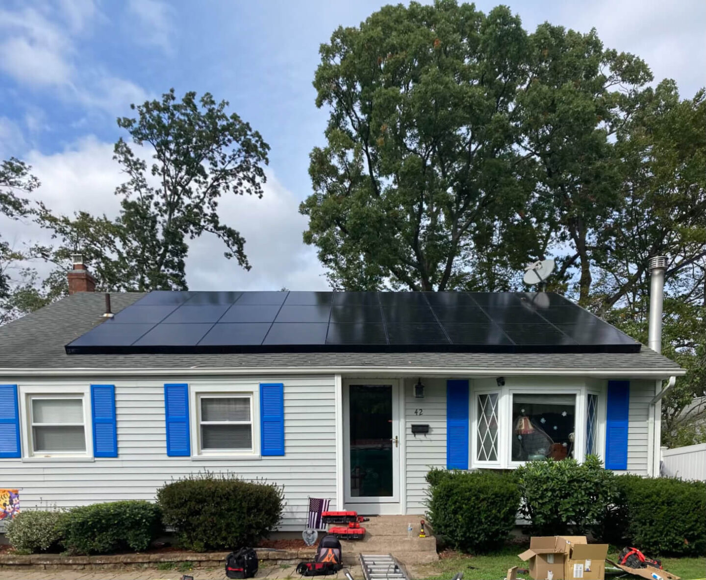 Solar panels on the roof of a home, making the most of natural resources to power the house efficiently.