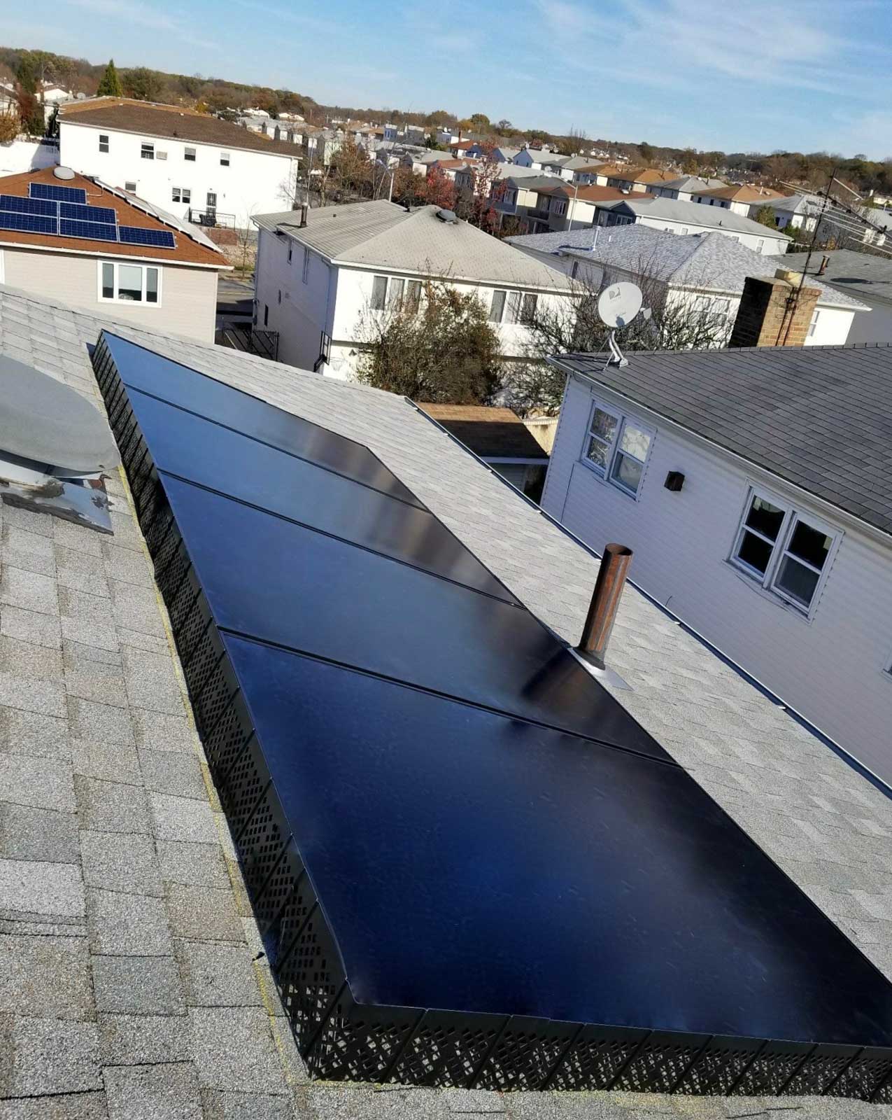 A property with solar panels installed on the roof by Venture Home's team of expert solar panel installers.

